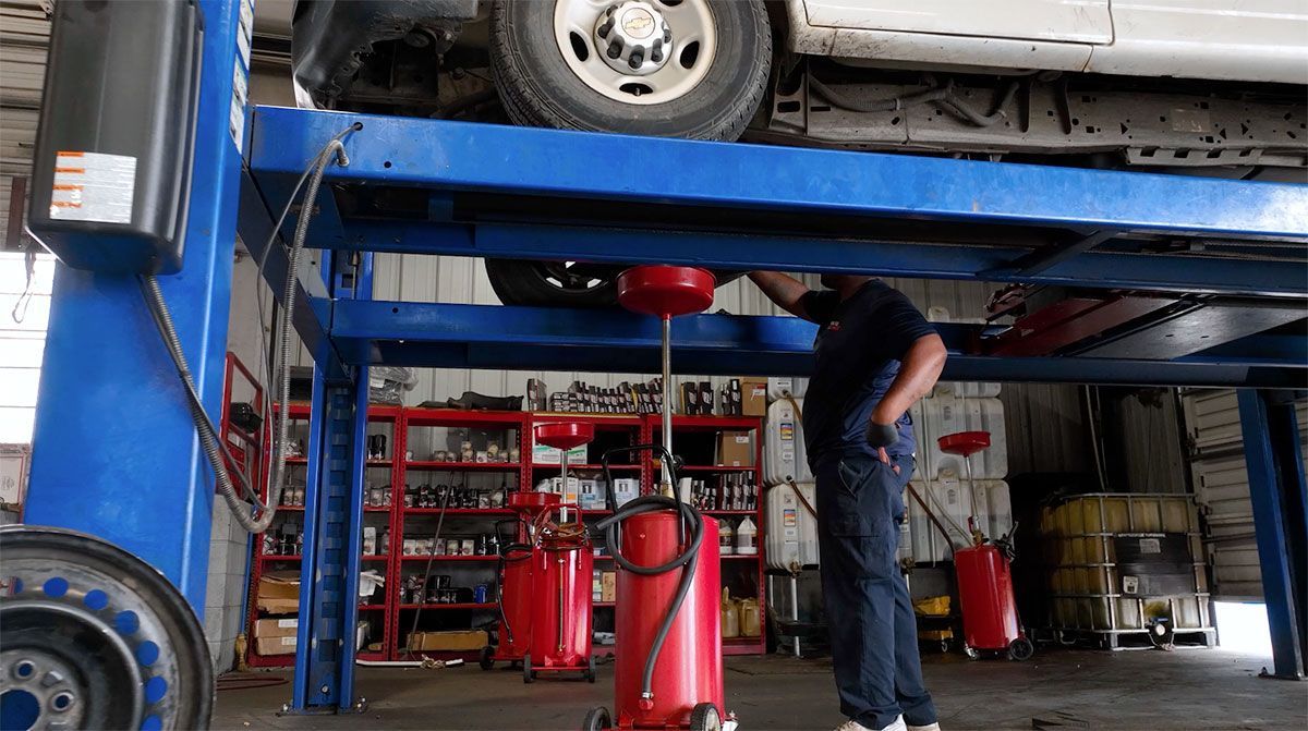 A bottle of motor oil on a white background