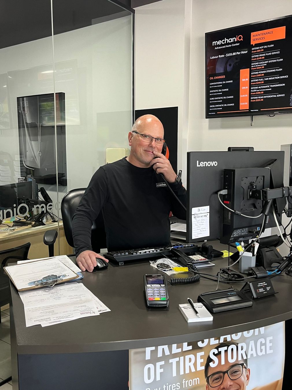 A person working at the front desk | MechaniQ
