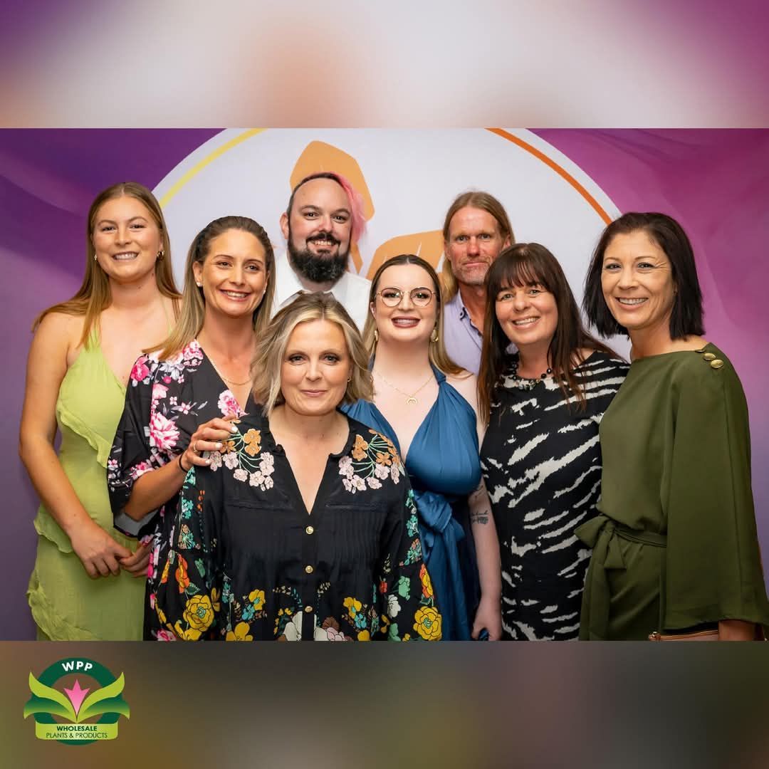 A plaque on a table that says awards of excellence 2021