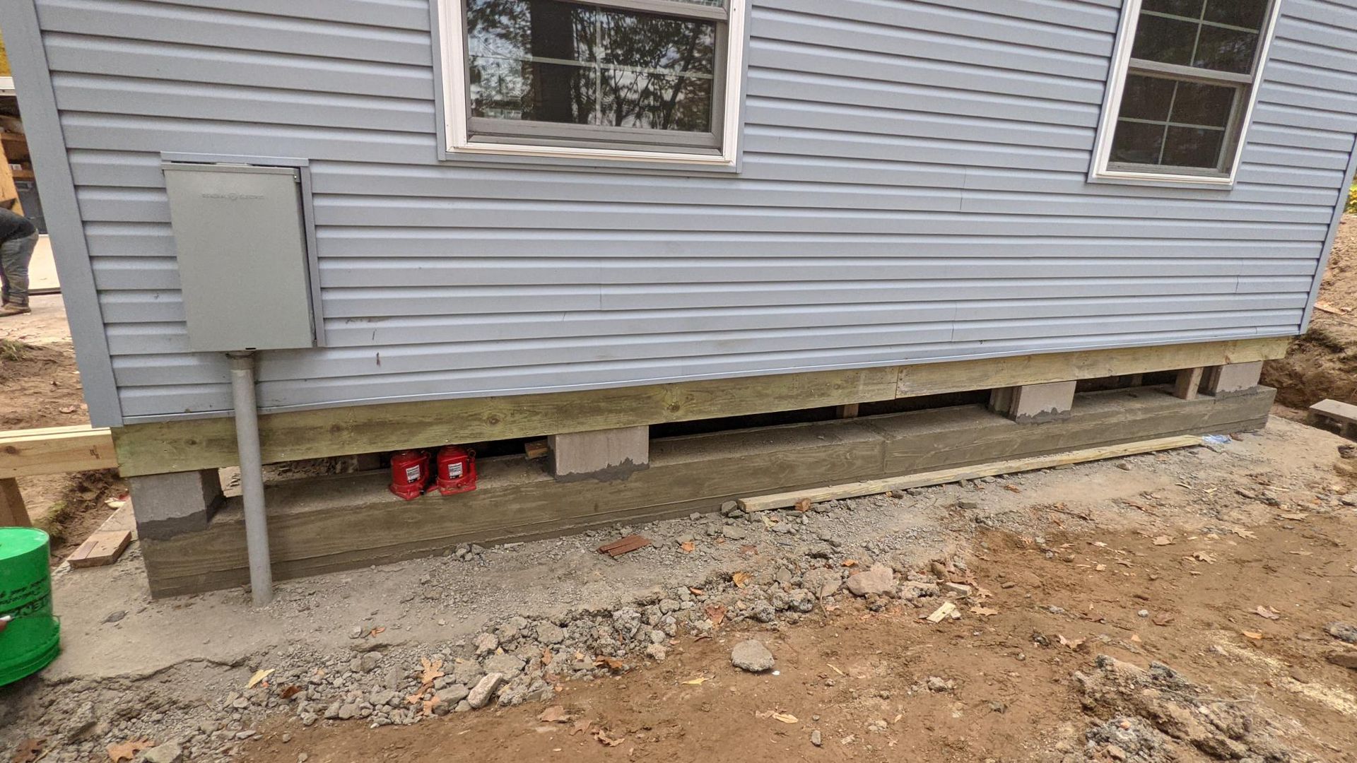 A house is being built on concrete blocks.