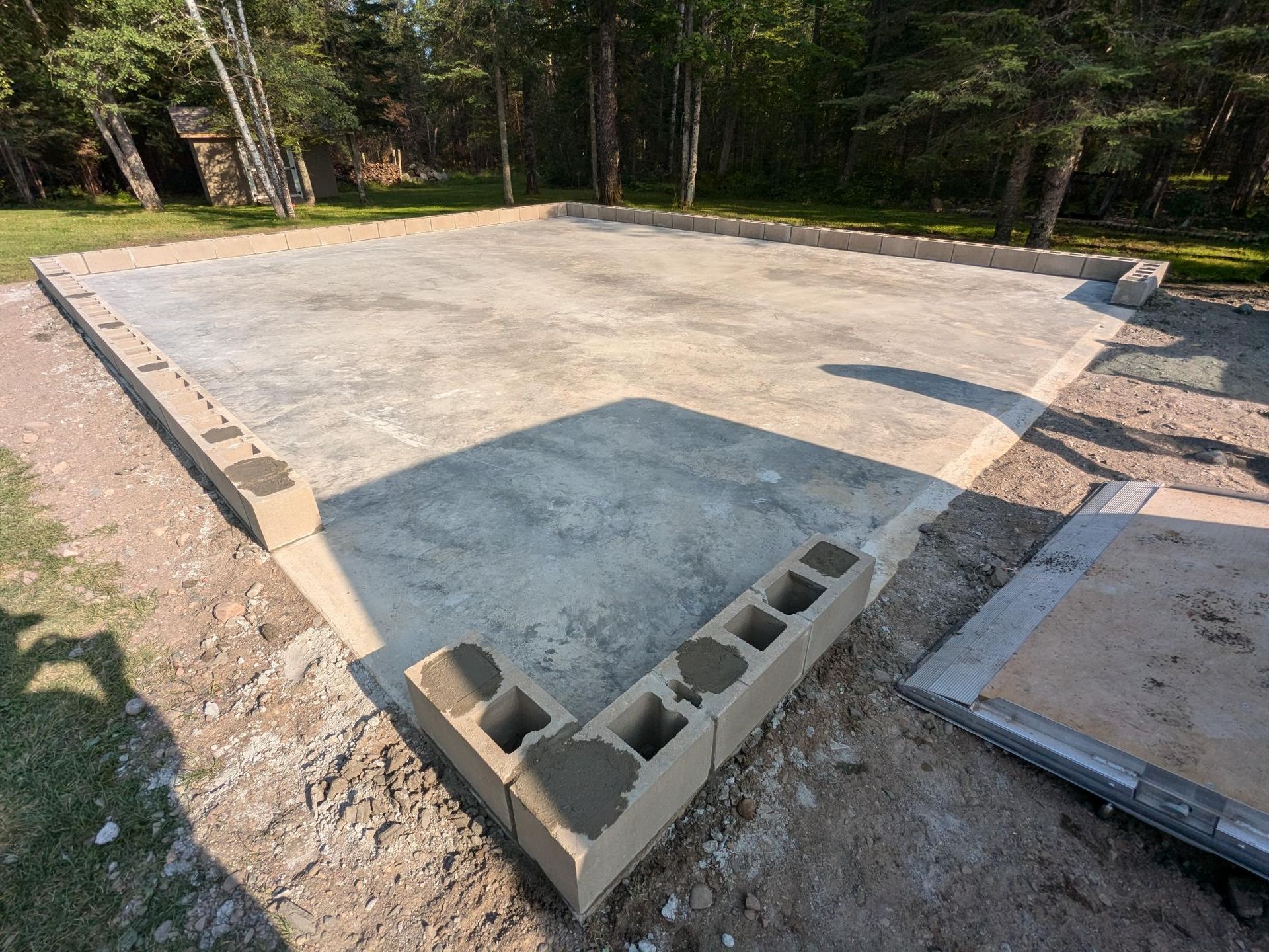 A concrete block is sitting on top of a concrete floor.