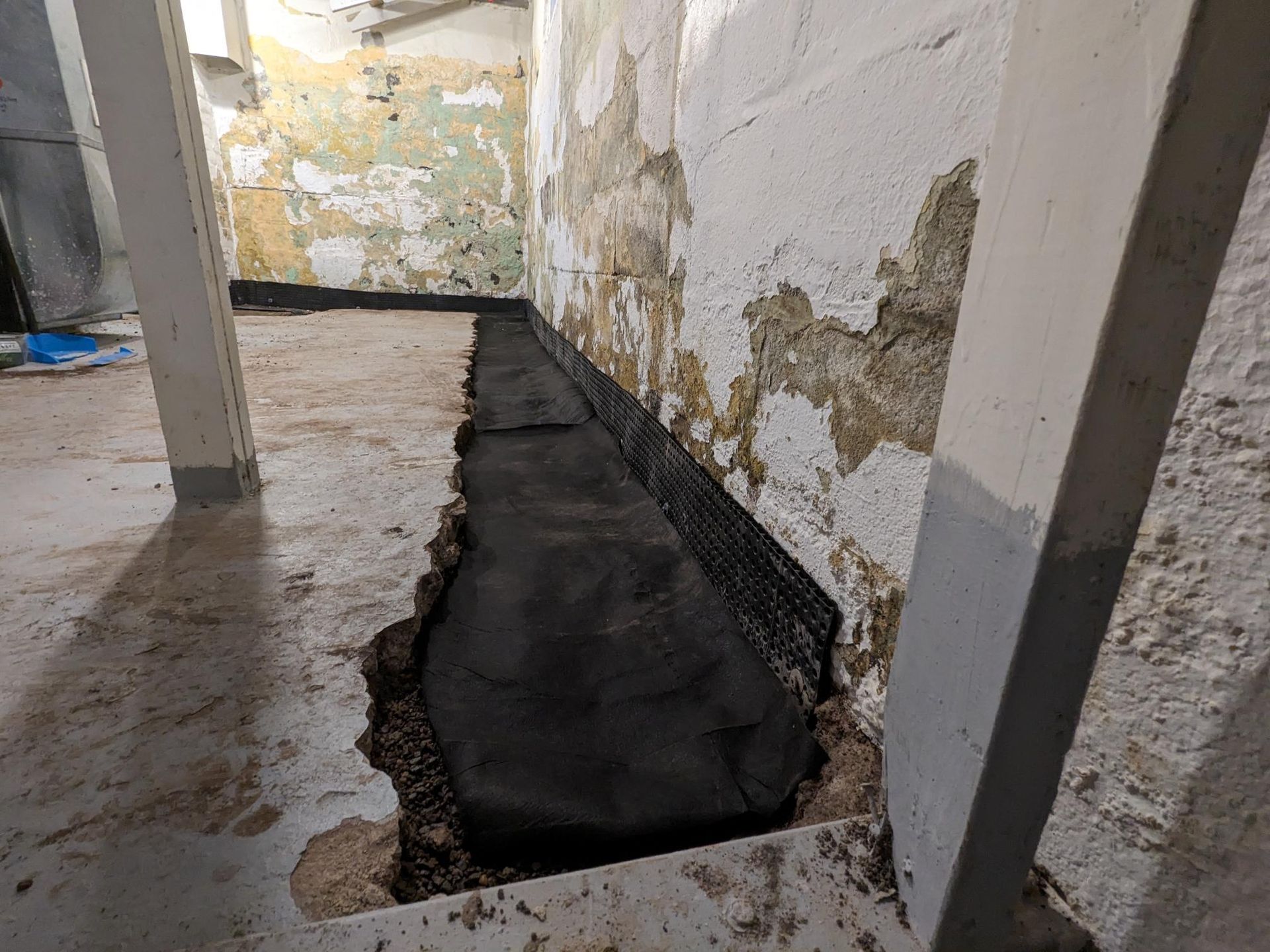 There is a hole in the wall in the basement.