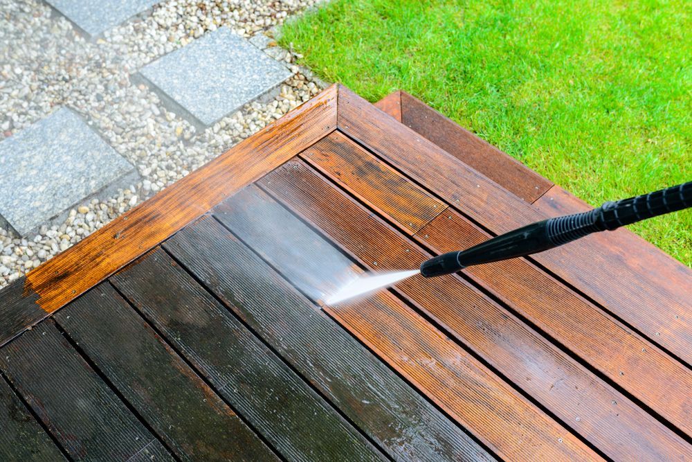 Pressure Washing a Wooden Deck — Coastal Pressure Solutions in Runaway Bay, QLD