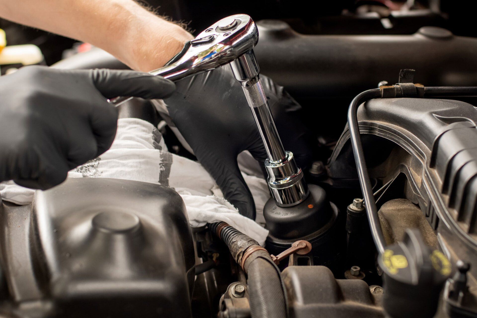 Hands with Socket Wrench — Slacks Creek, QLD — Jay Kay’s Auto Electrics
