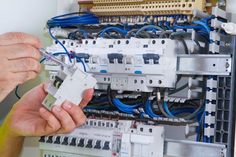 Electrician Checking Switchboards — Electrical Services In Bundaberg East, QLD