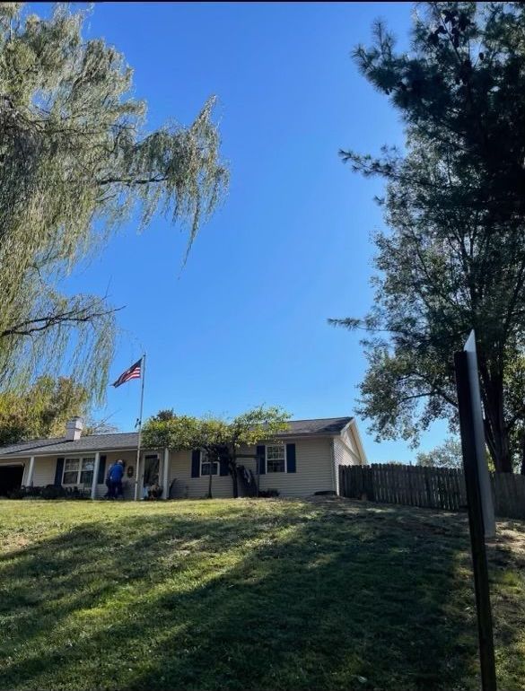 A house with a flag in front of it