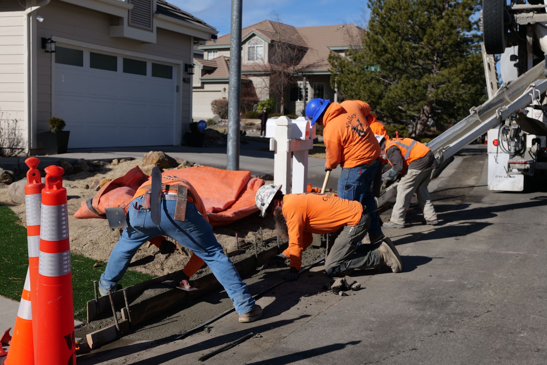 A large house with a driveway leading to it