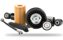 Assorted automotive parts: air filter, pulley, and shock absorbers. | Torque European Car Care