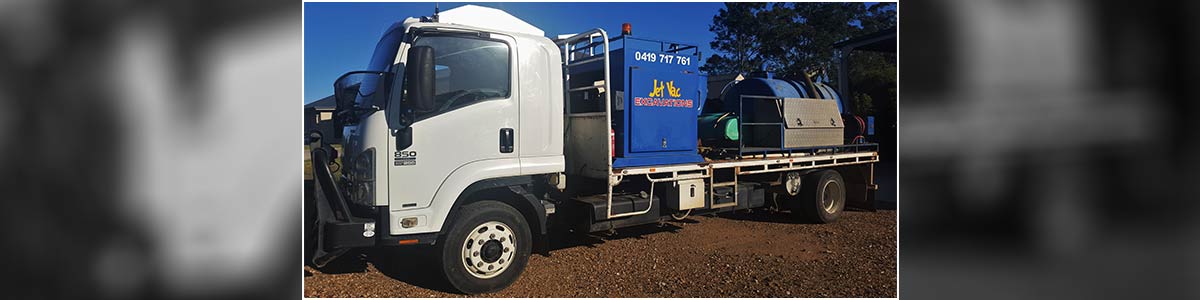 jet vac excavations white and blue excavation truck 