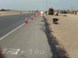 Una carretera con el número 171 + 980 escrito en ella