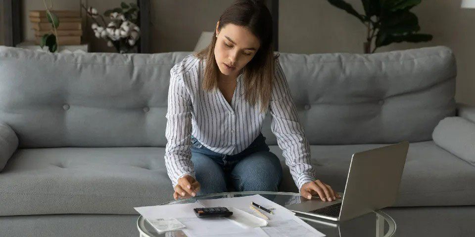 Woman Using Laptop — Clayton, GA — A.W. Adams Insurance LLC