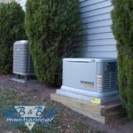 A generator is sitting on the side of a house.