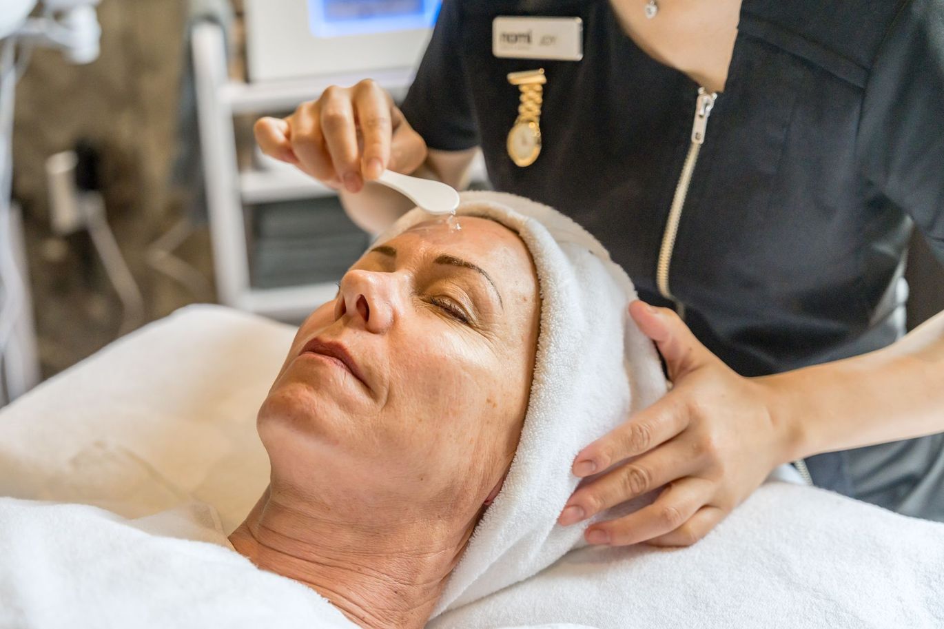 side view woman getting massaged spa