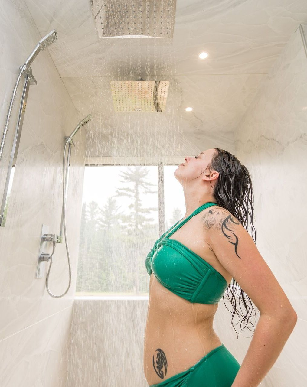 woman relaxing round outdoor bath