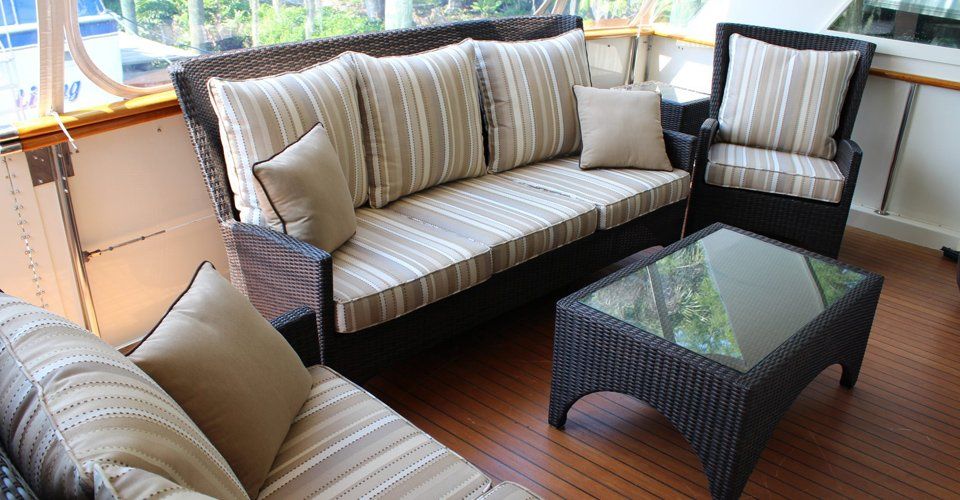 Stuff Restoring — Rattan Couch with Glass Table in Fort Myers, FL