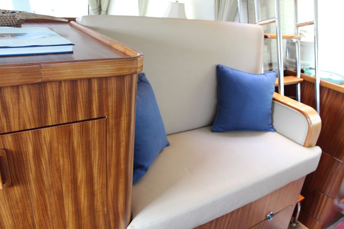 Custom RV Furniture  — Wood Frame Couch with Blue Pillow in Fort Myers, FL