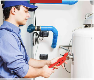 plumber adjusting pipe using wrench