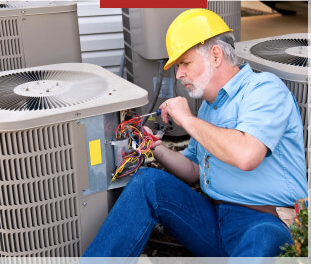 hvac techinician fixing hvac unit