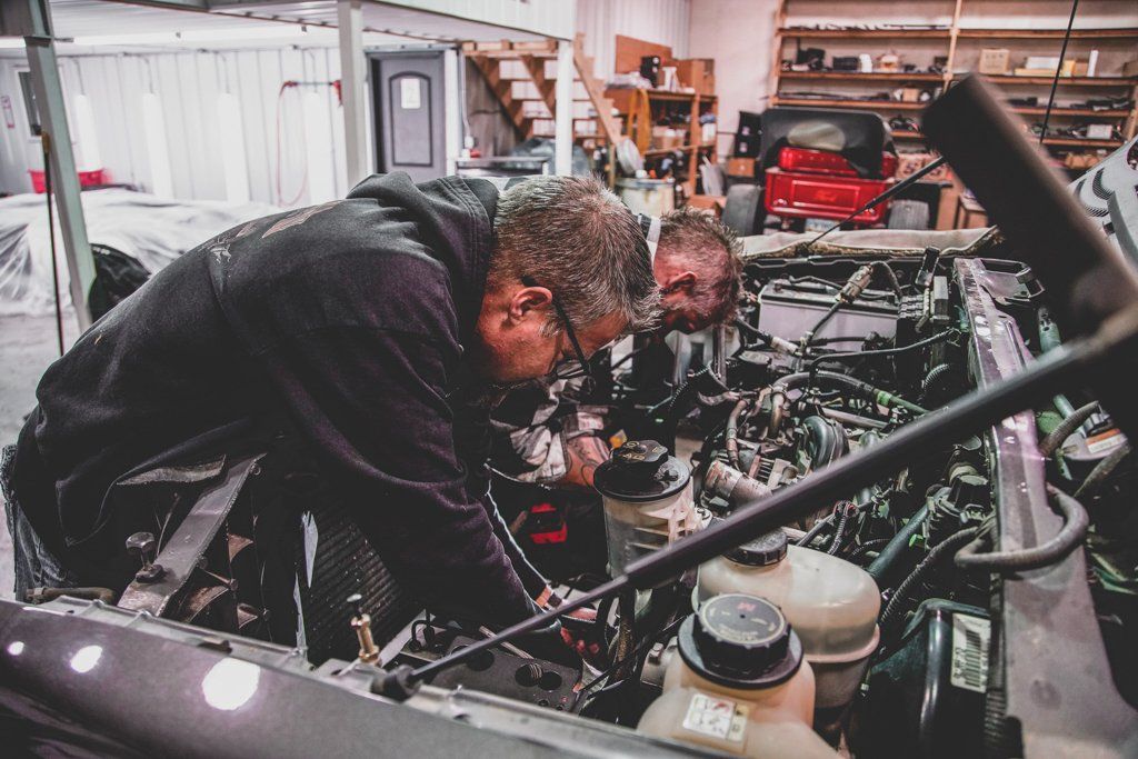 Dakota Kustomz performing maintenance