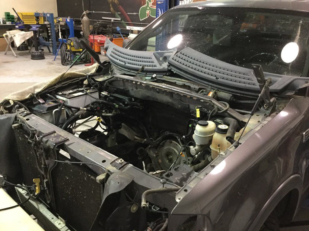 custom black 2004 ford f150 with engine removed