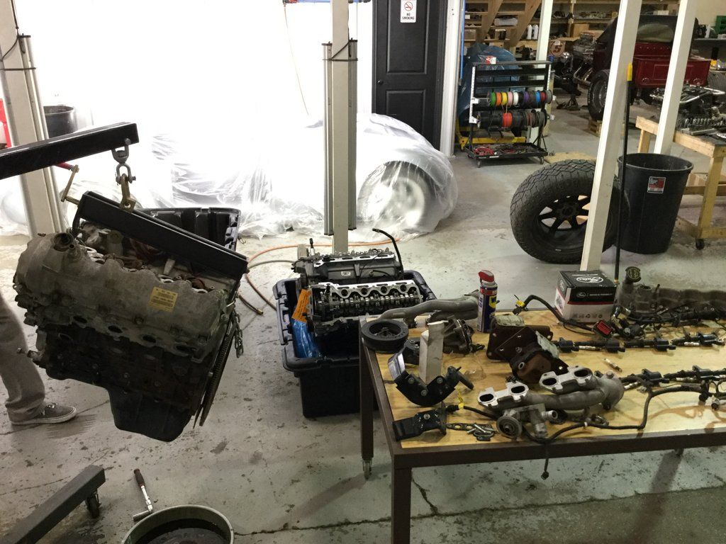 custom black 2004 ford f150 isolated images and parts on workbench