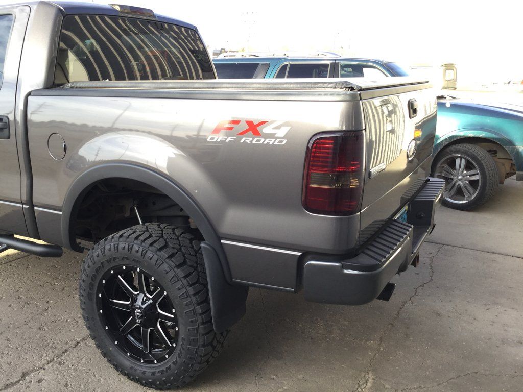 custom black 2004 ford f150 rear wheels
