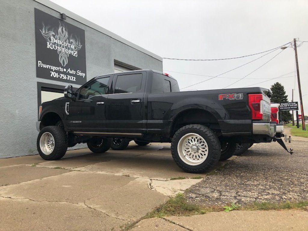 custom kelderman lift black pickup truck