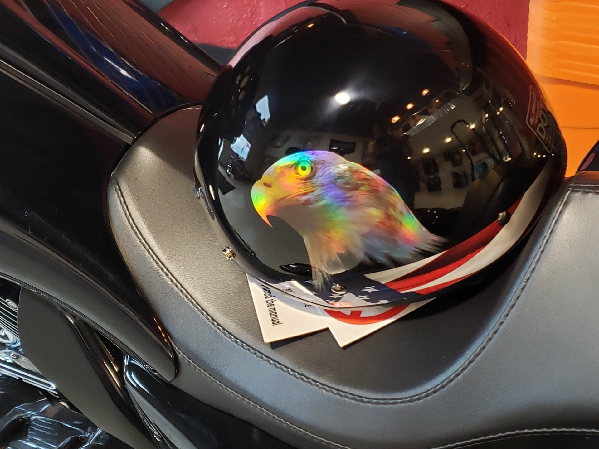 Black helmet painted with an eagle