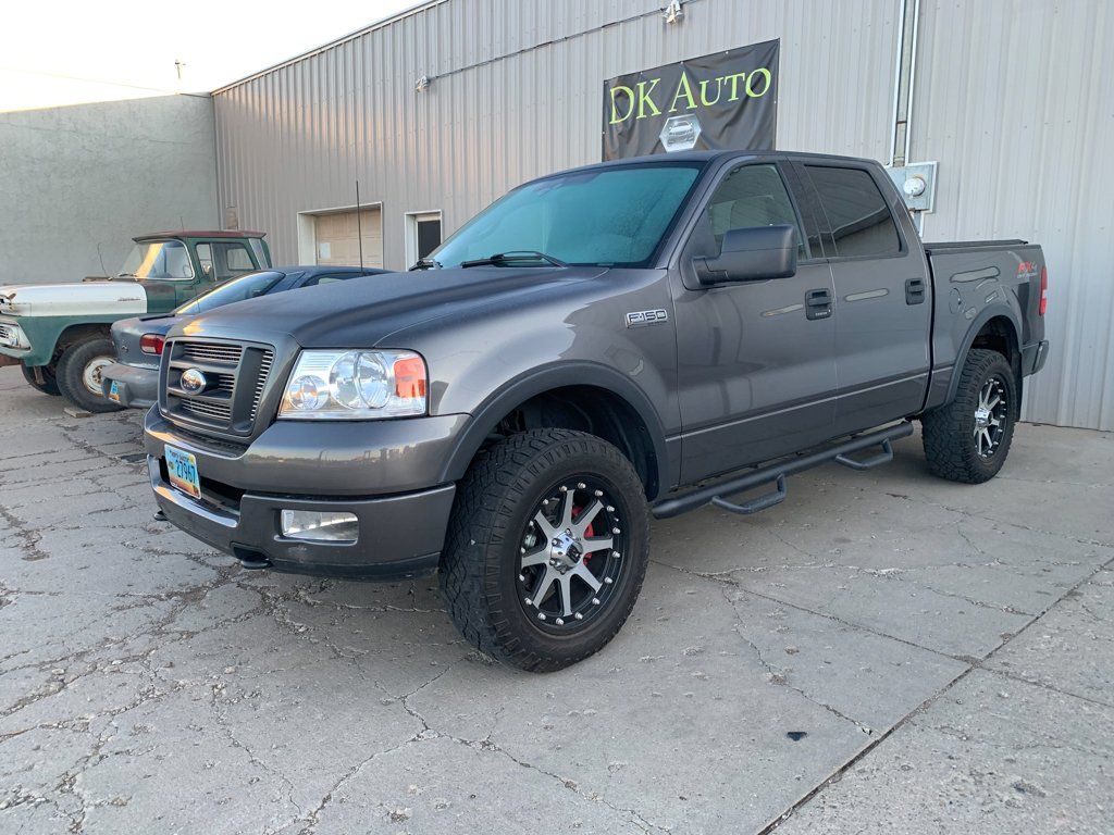 black 2004 ford f150 before customization front view