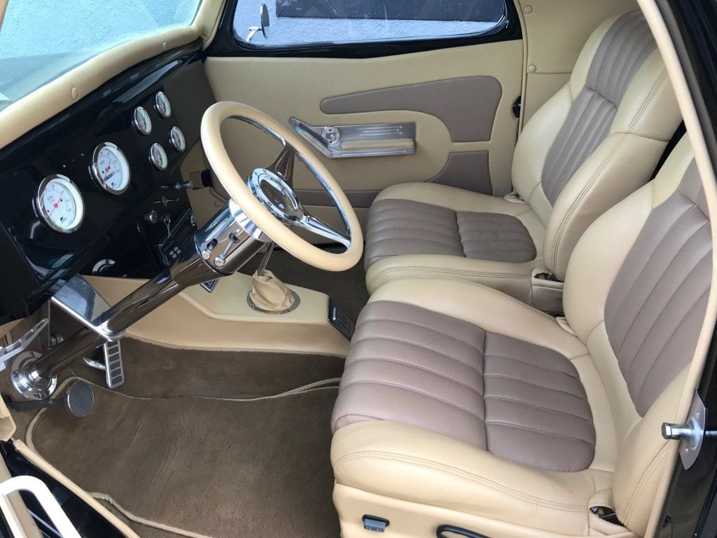 interior shot of cream-colored seats in willys coupe