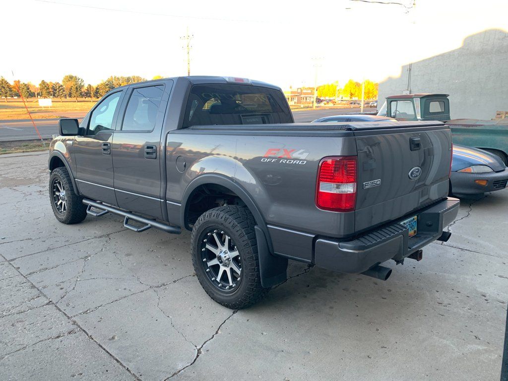 black 2004 ford f150 before customization back view