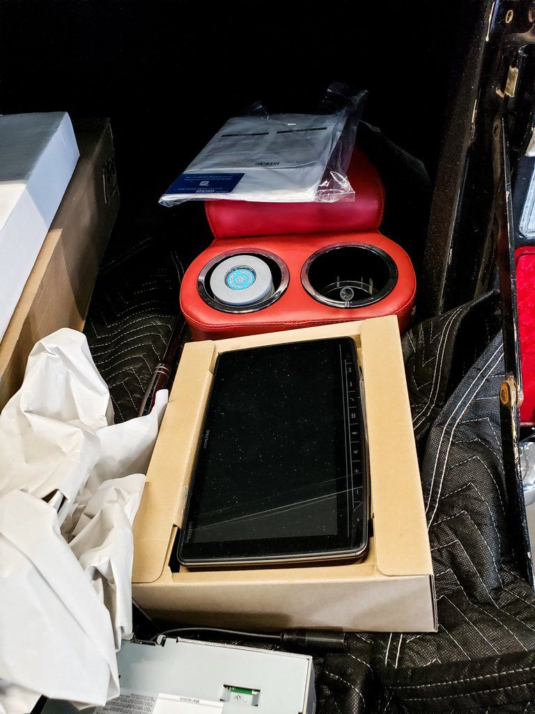 red cup oldering in box on top of moving blankets