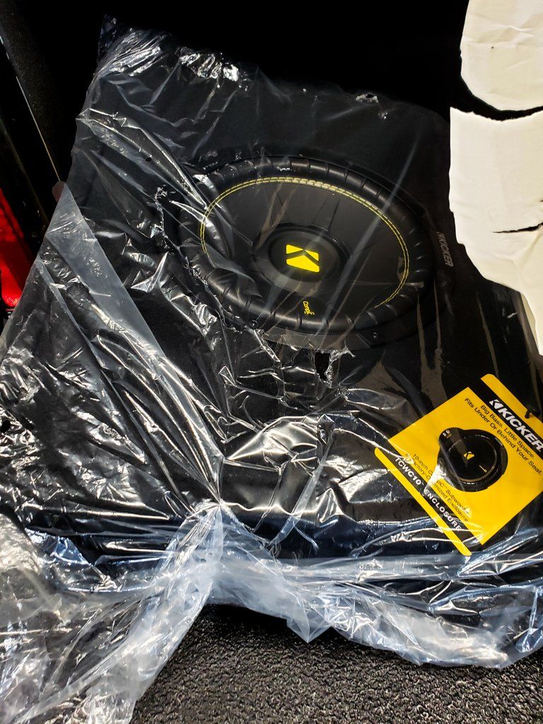 kicker brand speaker in plastic wrapping