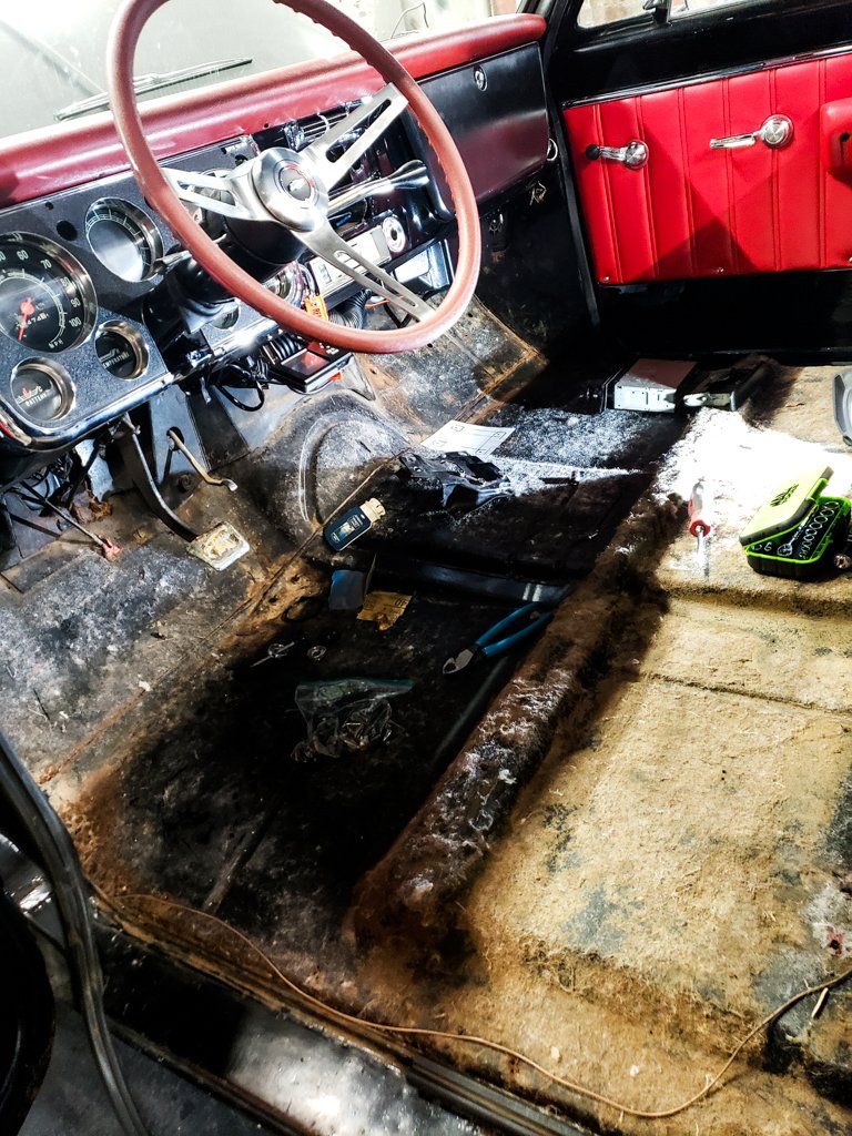 interior view of driver's side front seat with seat removed