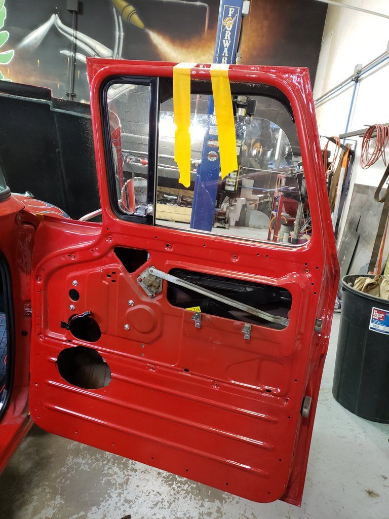 view of red passenger side door