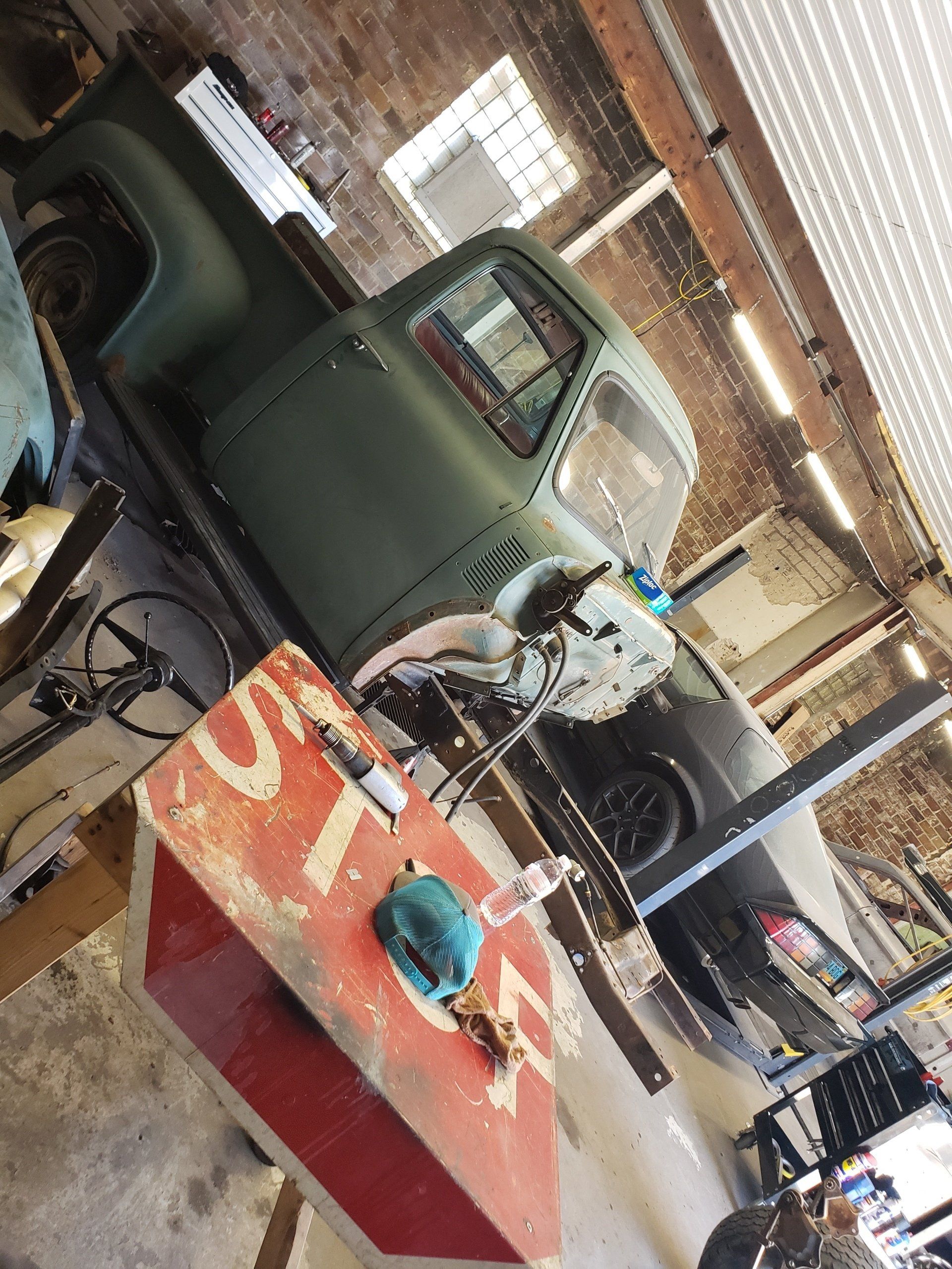 Truck inside an auto repair shop