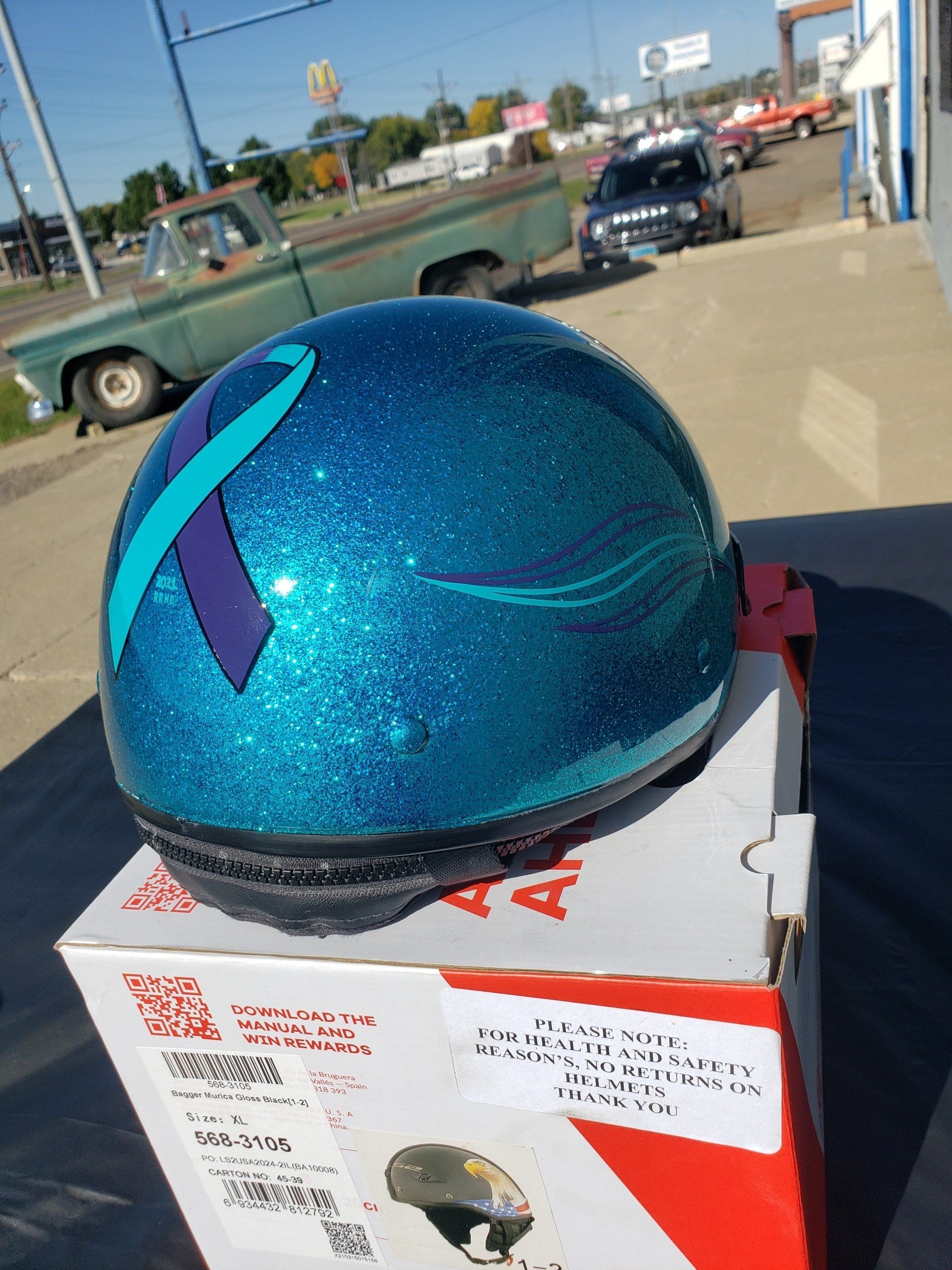 Blue helmet on top of a box