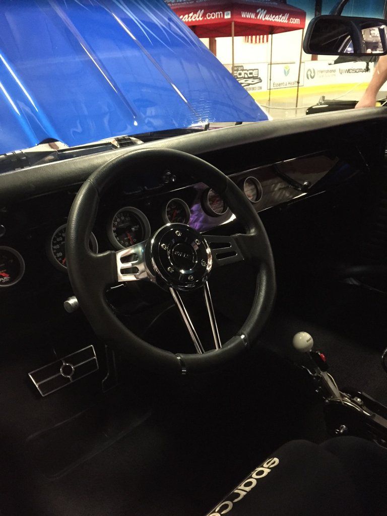 interior view of car steering wheel and dashboard