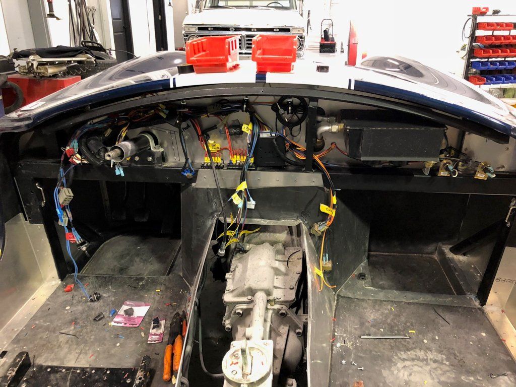 central console stripped with exposed wires