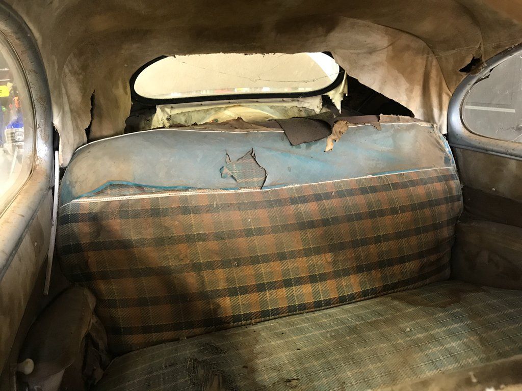 stained and browned rear car seats