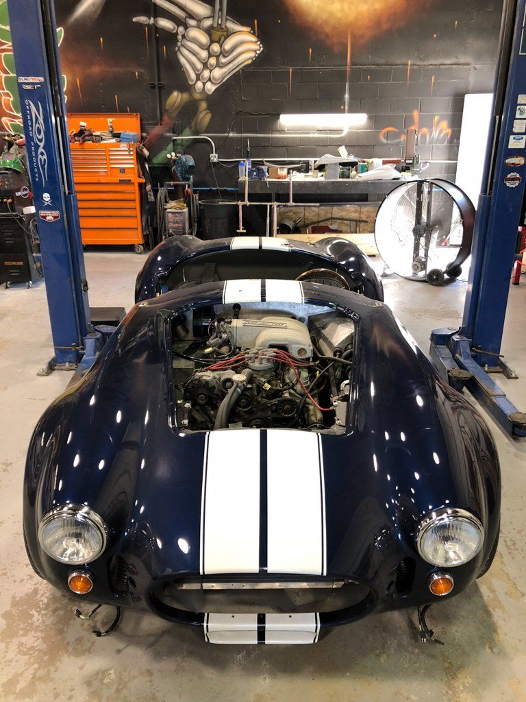 front view of hot rod with engine removed
