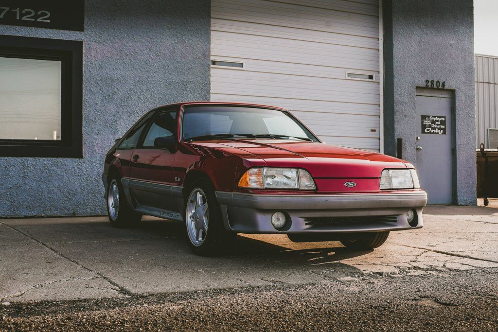 car in front of close garage doors