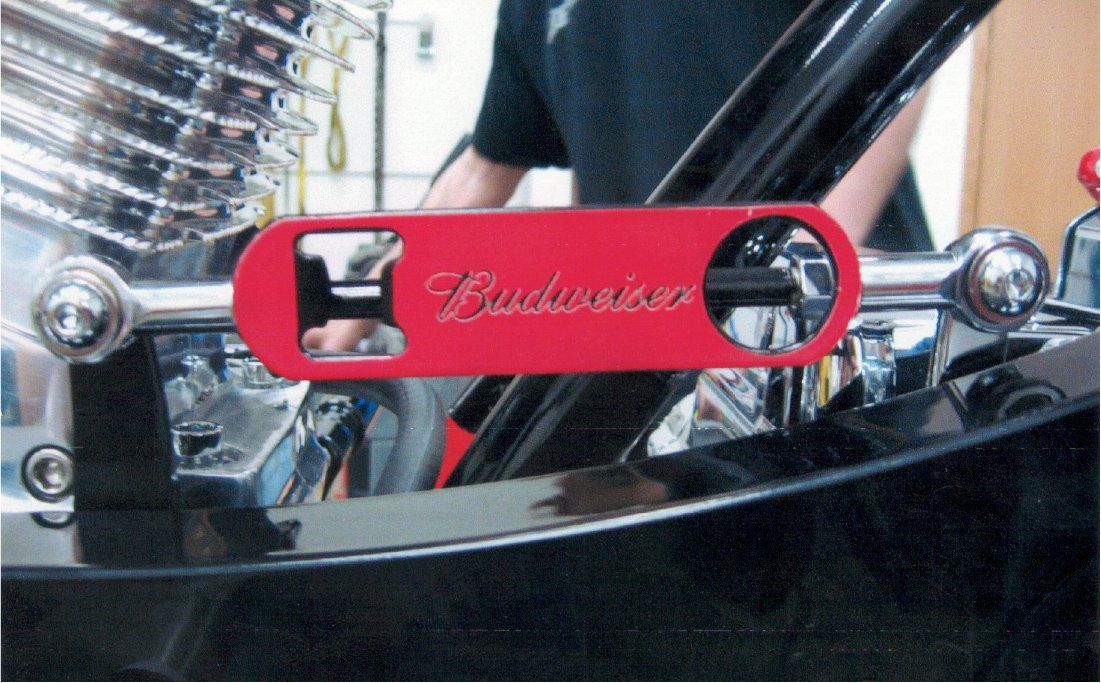 close up of budweiser bottle opened built on chopper frame