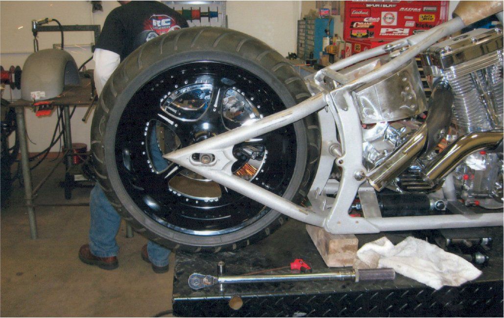 close up of rear wheel on workbench