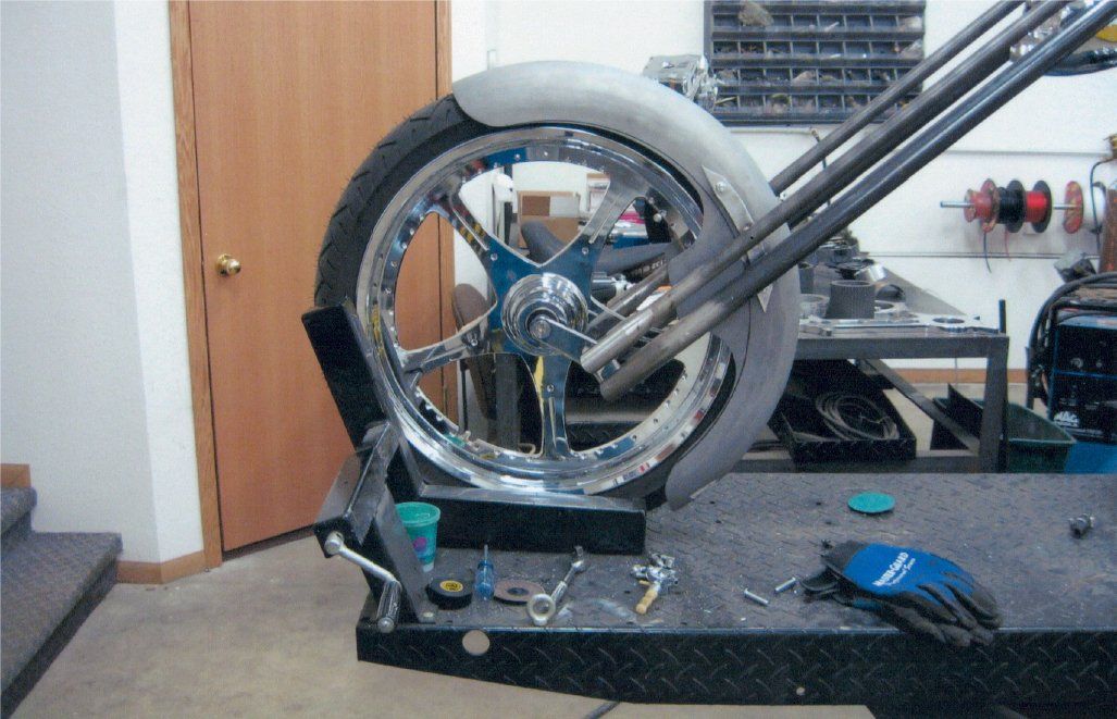 close up of front wheel of chopper