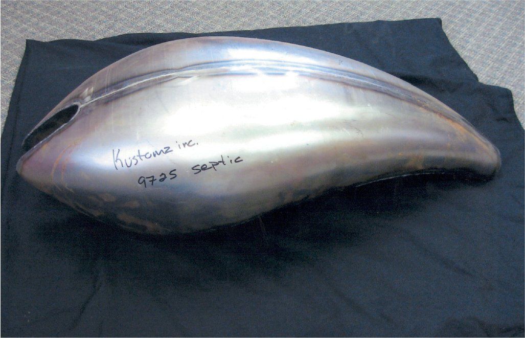 fuel tank cover with no paint with Kustomz Inc 9725 septic written on it