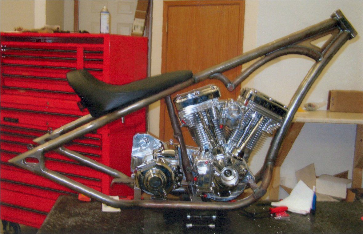ride side view of chopper's seat, engine, and frame