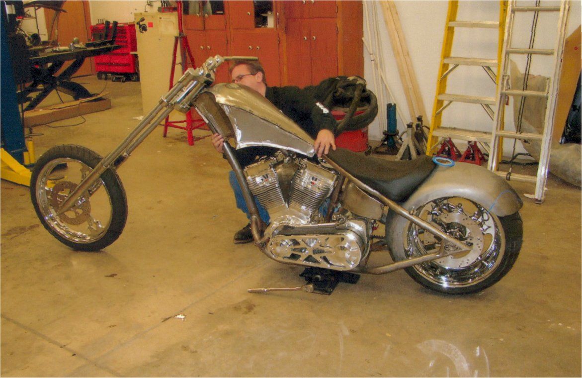 worker inspecting chopper before customization