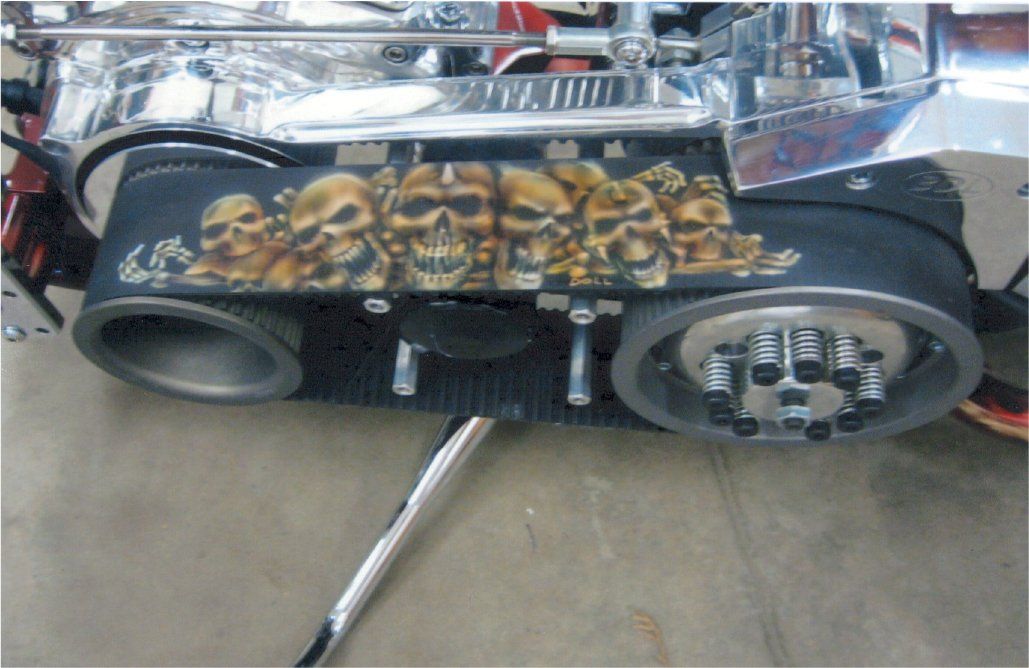 close up of custom chopper belt with skull designs