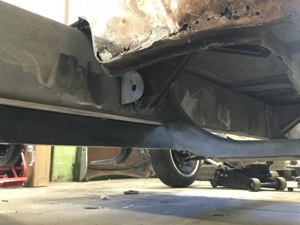 low under side view of truck frame parts